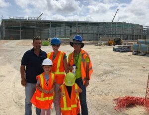 Family on construction of new building
