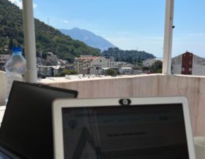 working on the laptop on the roof terrace